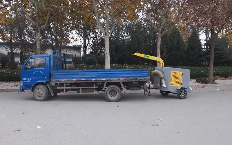 Trailer-mounted tow-behind leaf collectors