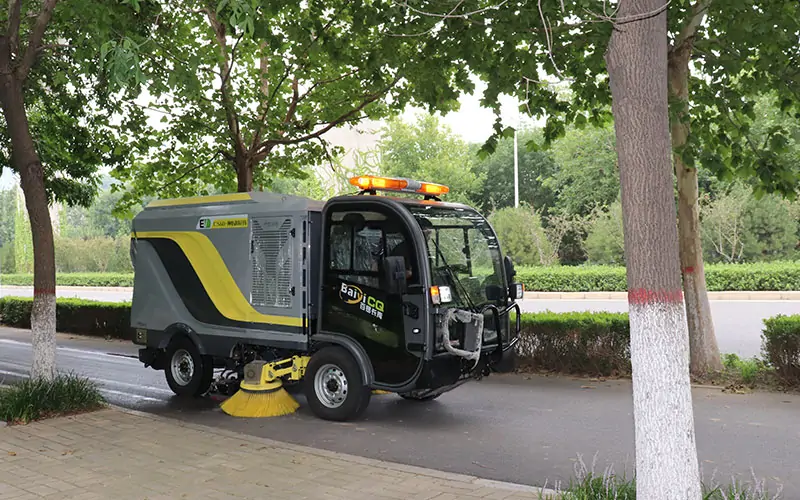 Electric road washer and sweeping vehicle