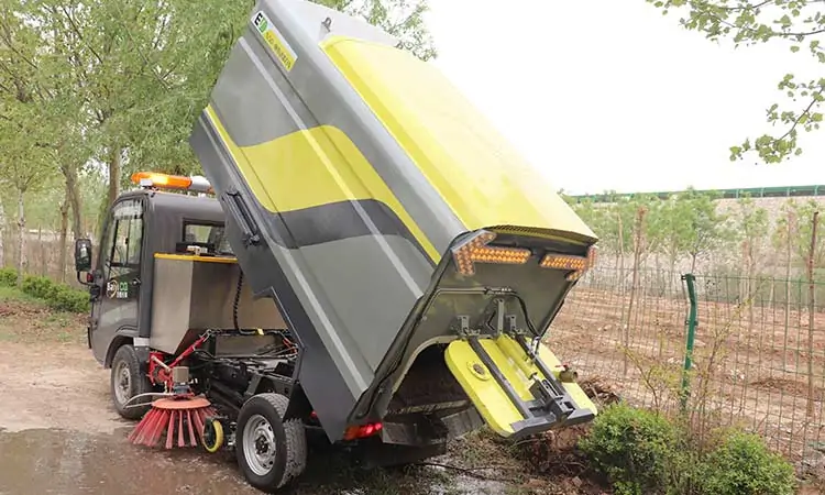 Electric Sweeper Dumping Garbage