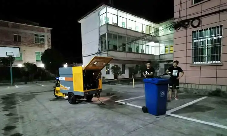 Small electric tricycle street washer vehicle