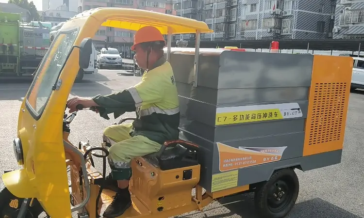 Small Street Washer Are A Common Sight On The Roads Of Chinese Cities