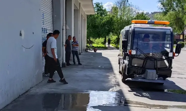 Customer Training Of Street Washing Truck Sent To A Property