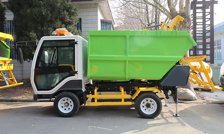 Small Garbage Trucks Clean up the Trash in the City