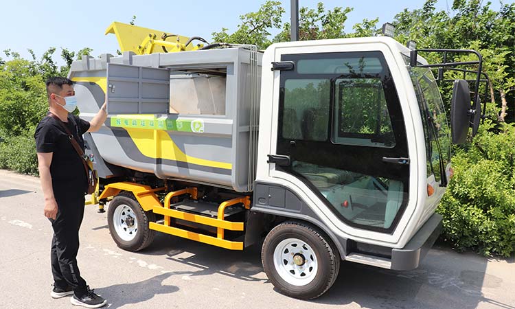 Efficient Waste Management: The Electric Community Garbage Collection Vehicle